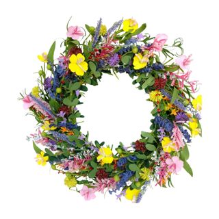 A colorful spring wreath with yellow, purple, and pink flowers arranged in a circle and eucalyptus leaves around them