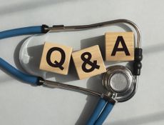Q and A acronym on blocks. Question about hospital, health, medicare concept. QnA