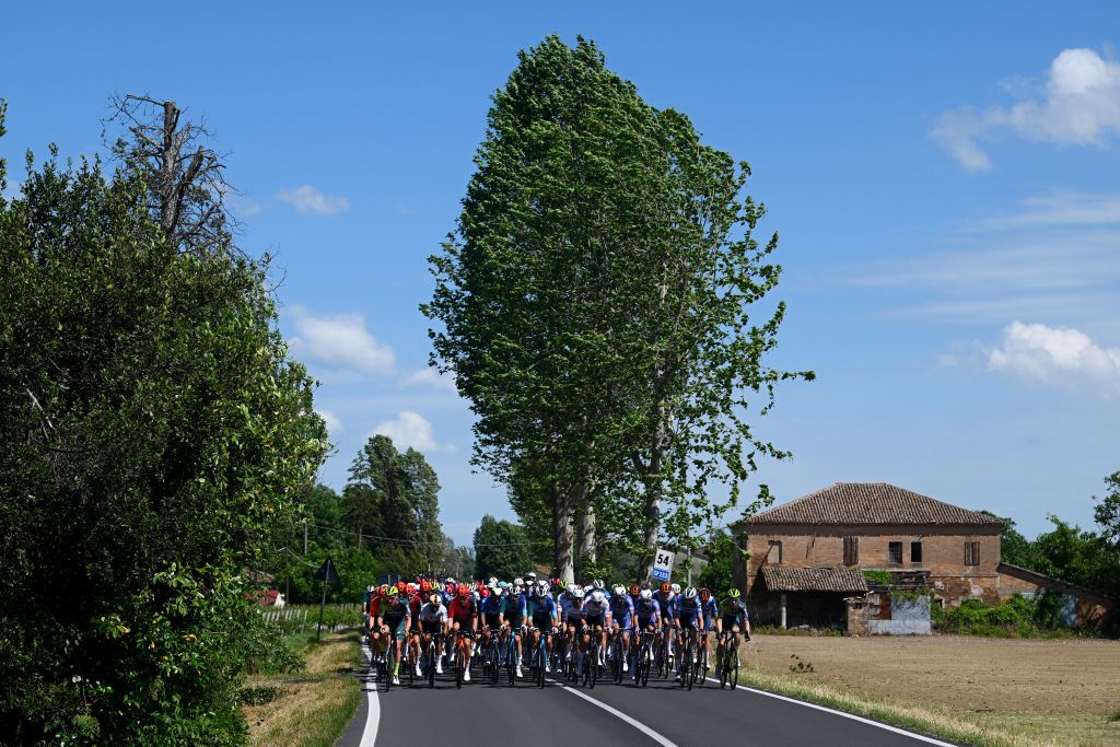 CENTO ITALY MAY 17 LR Tobias Foss of Norway and Team INEOS Grenadiers Fernando Gaviria of Colombia and Movistar Team Ben OConnor of Australia Damien Touze of France and Decathlon AG2R La Mondiale Team Domen Novak of Slovenia and UAE Team Emirates Pieter Serry of Belgium and Team Soudal QuickStep and Maximilian of Schachmann of Germany and Team BORA hansgrohe lead the peloton during the 107th Giro dItalia 2024 Stage 13 a 179km stage from Riccione to Cento UCIWT on May 17 2024 in Cento Italy Photo by Dario BelingheriGetty Images