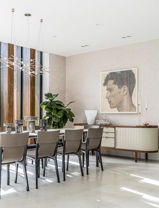 Dining room and art in bright Miami home