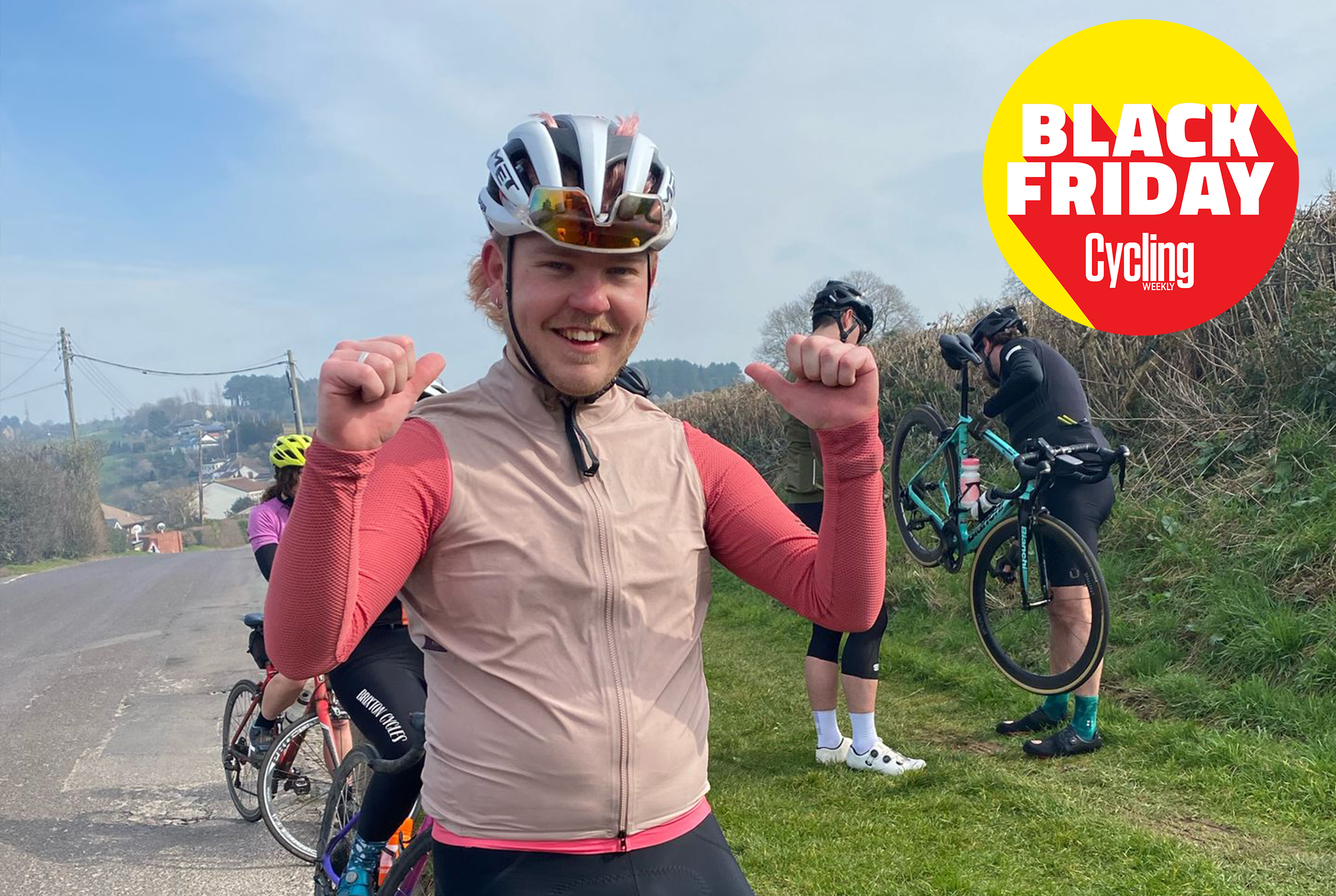 Adam Becket wears a pink MAAP vest over a pink long-sleeve jersey