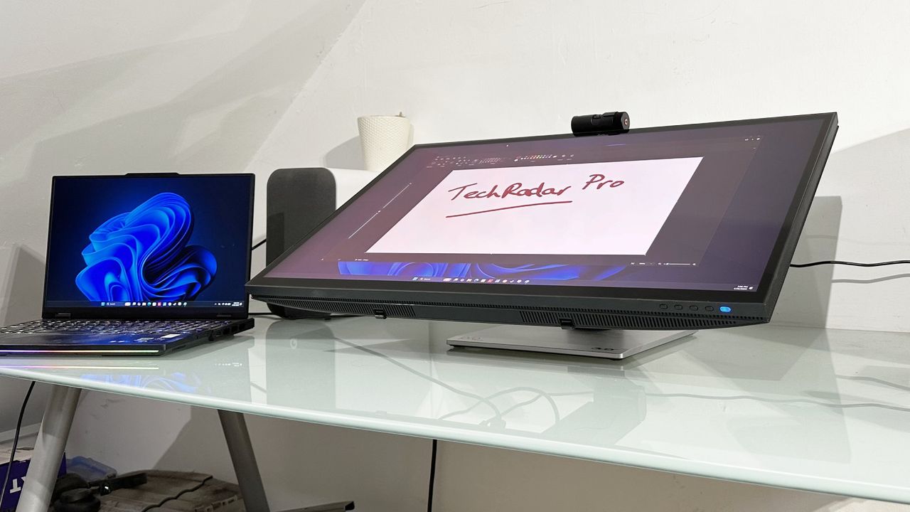 The Acer ProDesigner PE320QXT on a desk in a home office during our testing process