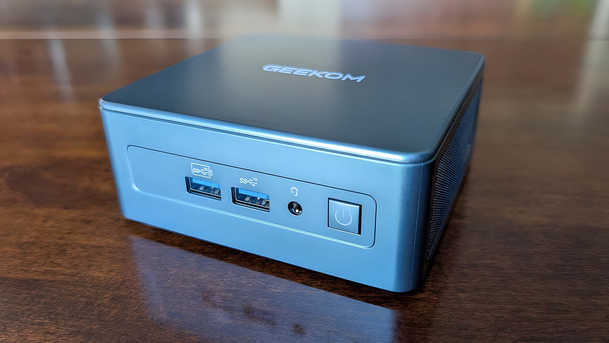 A closeup of the front side of the Geekom Mini IT13.