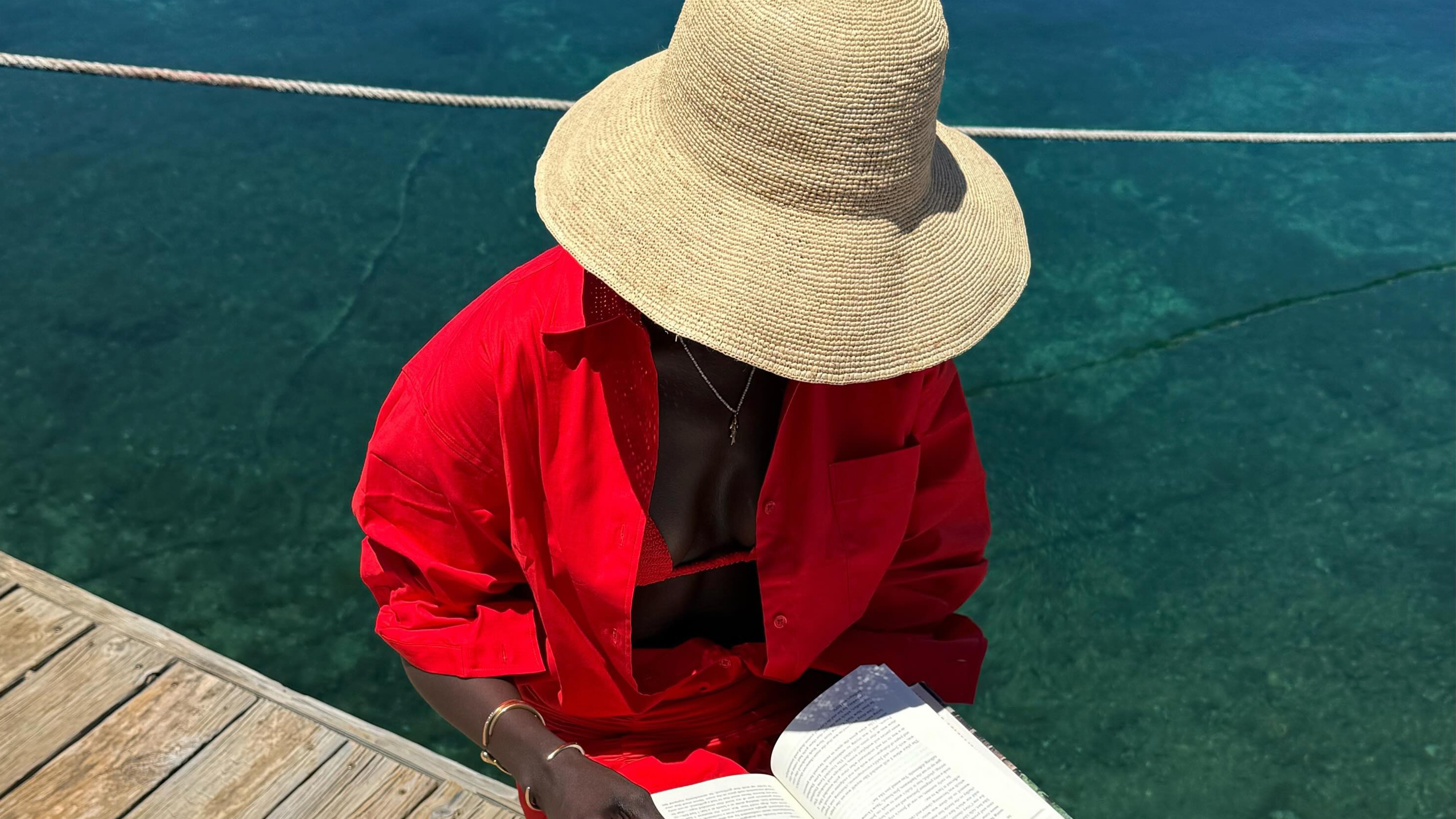 Amy Lefevre wearing a raffia hat.