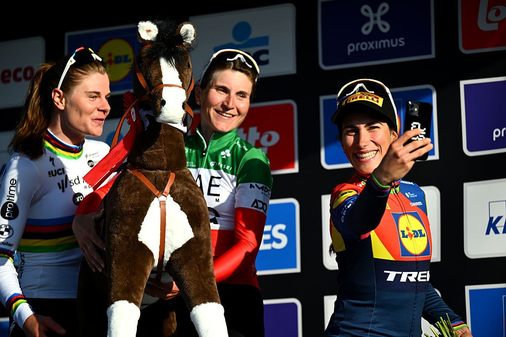 WAREGEM BELGIUM APRIL 02 LR Lotte Kopecky of Belgium and Team SD Worx Protime on second place race winner Elisa Longo Borghini of Italy and UAE Team ADQ and Elisa Balsamo of Italy and Team Lidl Trek on third place pose and take a selfie on the podium ceremony after the 13rd Dwars door Vlaanderen 2025 Womens Elite a 1285km one day race from Waregem to Waregem UCIWWT on April 02 2025 in Waregem Belgium Photo by Luc ClaessenGetty Images