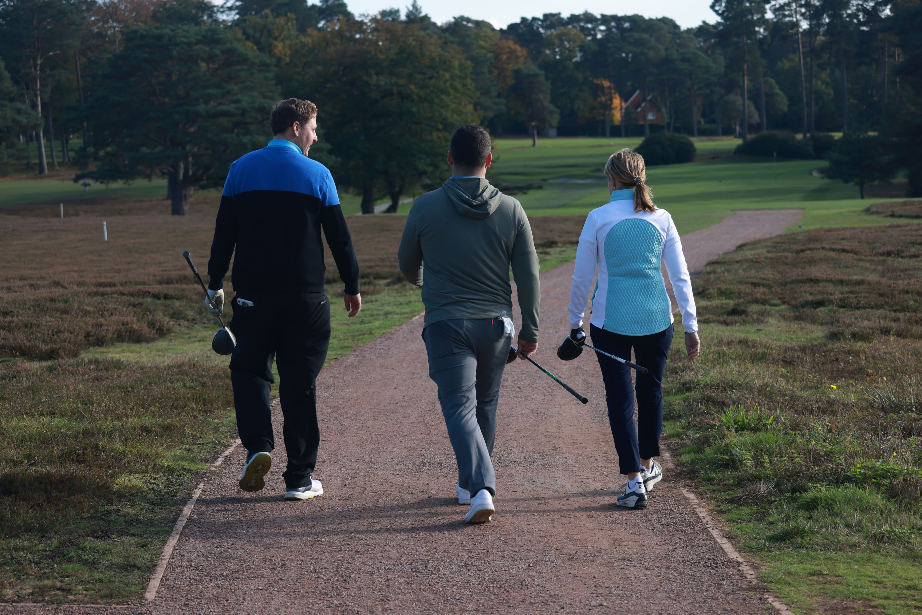 Golfers walking