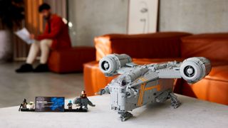 LEGO Razor Crest Ultimate Collector Series promo shot with the fully-built set on a coffee table