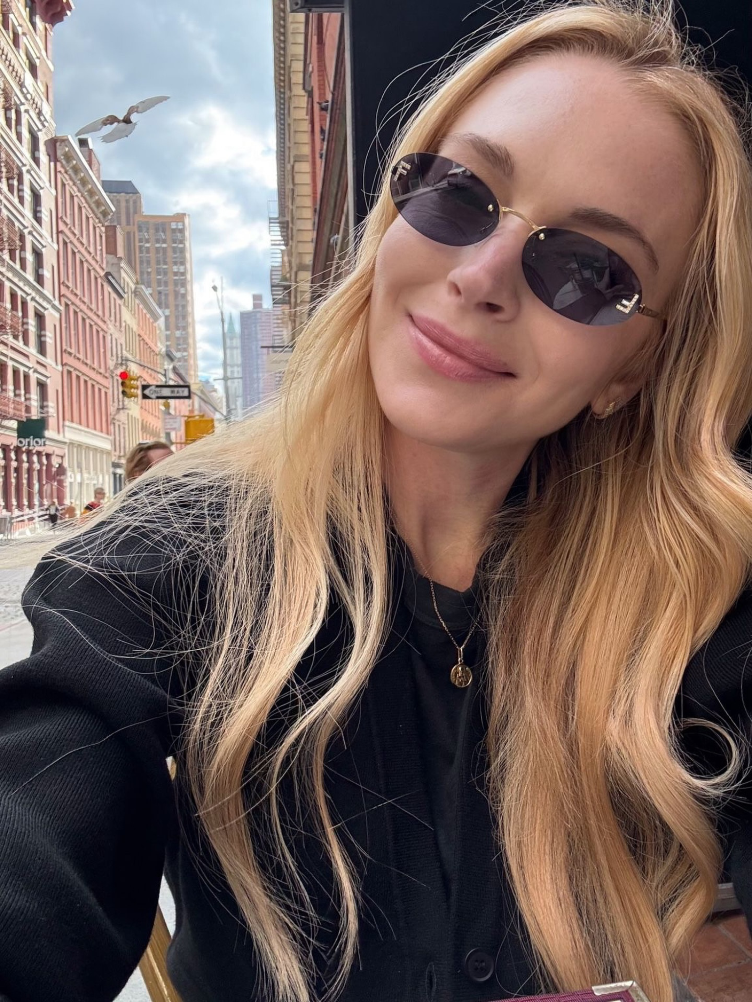 Lindsay Lohan with light, wavy hair