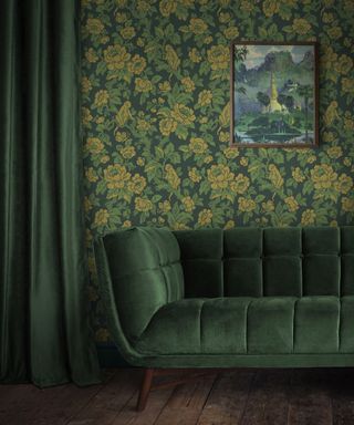 colors that go with dark green, living room with dark green walls and couch, green and ochre wallpaper, artwork