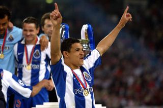 Derlei celebrates Porto's Champions League win in 2004.