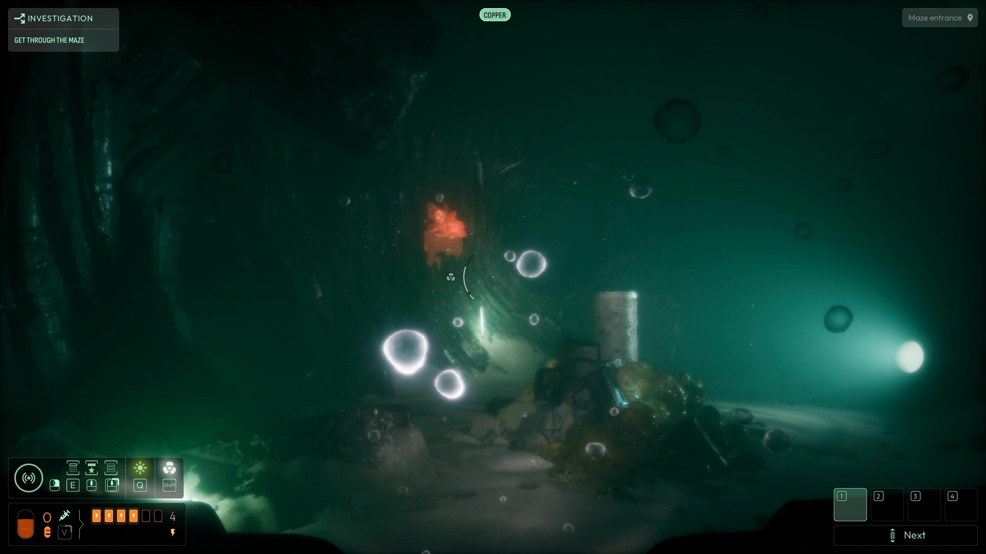 Noah swims through a rocky underwater maze in Cthulhu: The Cosmic Abyss, heading towards glowing orange lichen and a strange cylindrical pillar