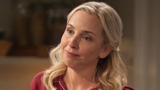 Becky smiling in red zippered hoodie on The Conners Season 7