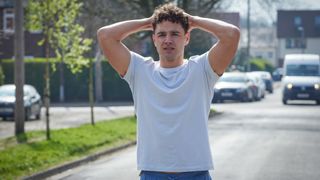 Donte Charles (Adam Thomas) with his hands on his head in the street in waterloo Road