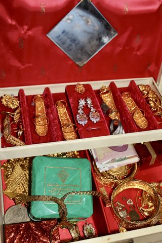 A box with various jewelry