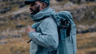 A man wearing the Montane Trailblazer