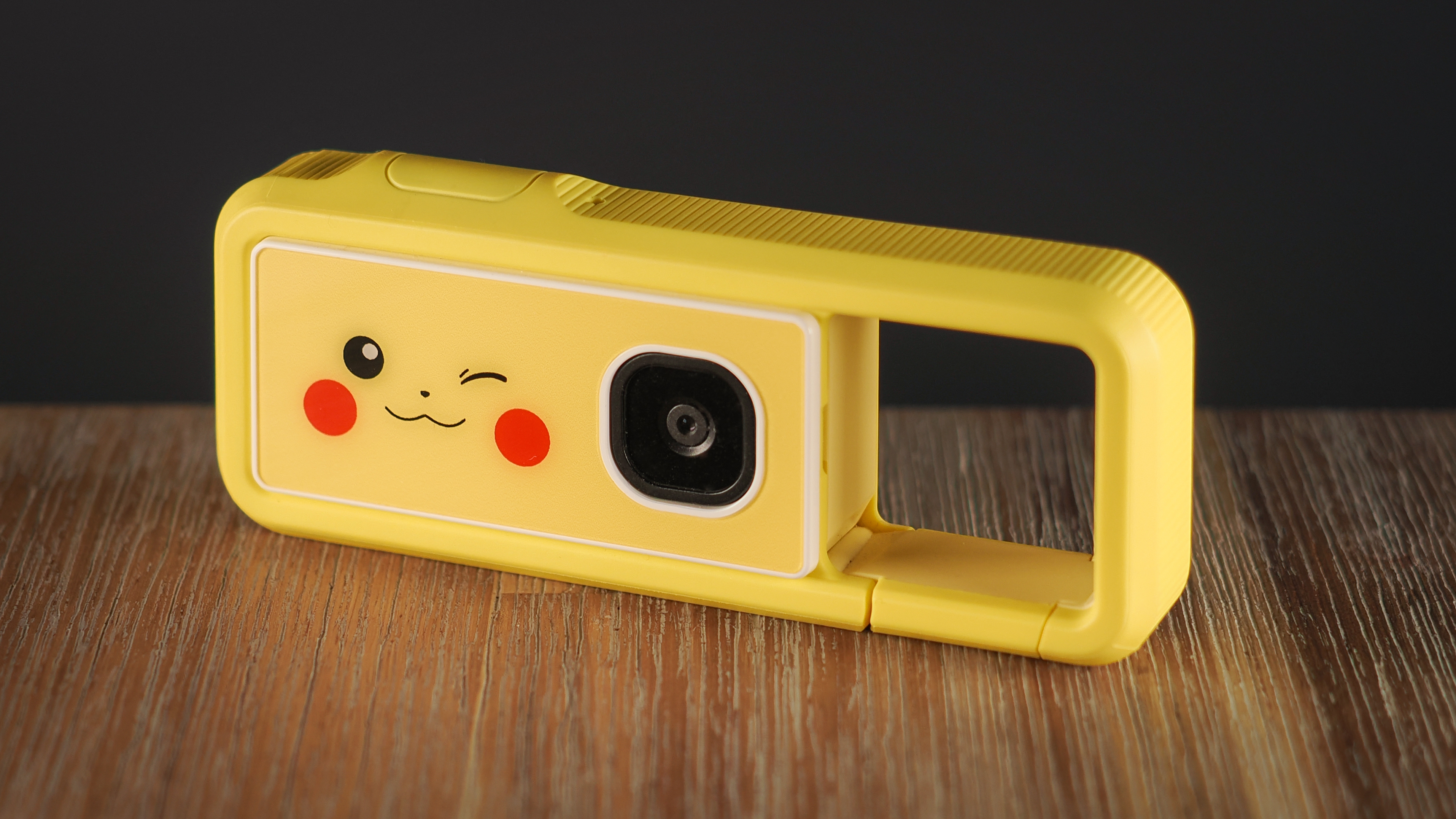 Canon Ivy Rec Pikachu Edition on a wooden surface