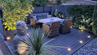 small decking with seating and outdoor lighting