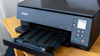 Canon PIXMA TS6420a Wireless All-In-One Inkjet Printer being tested in writer's home