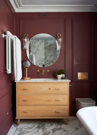 bathroom with rust colored walls