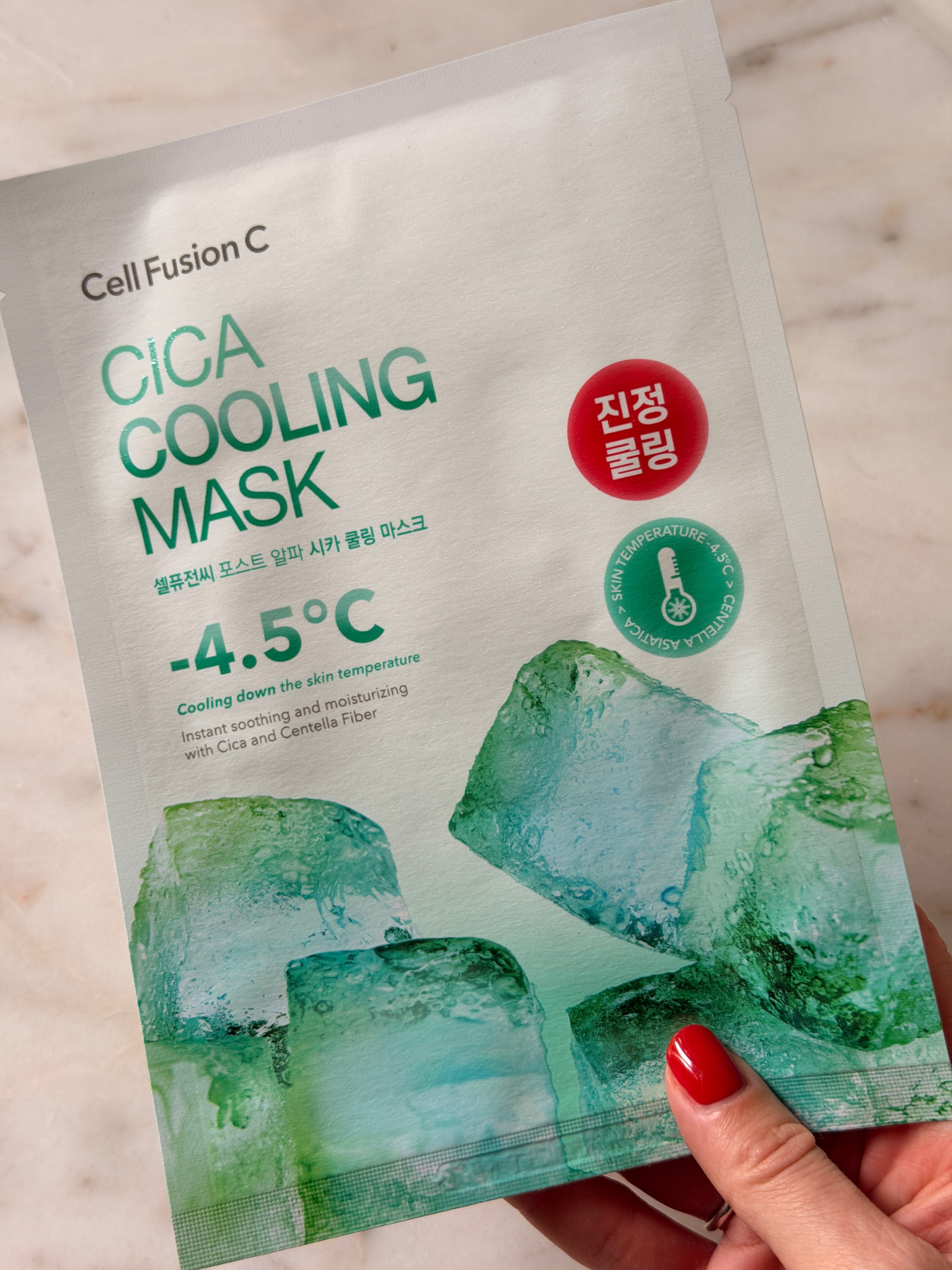 Freelance beauty editor Grace Day holding the Cell Fusion C face mask