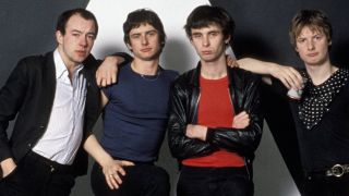 Photo of XTC; Barry Andrews, Terry Chambers, Colin Moulding and Andy Partridge (Photo by Fin Costello/Redferns)