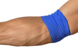 Veins are seen in a person's muscular arm