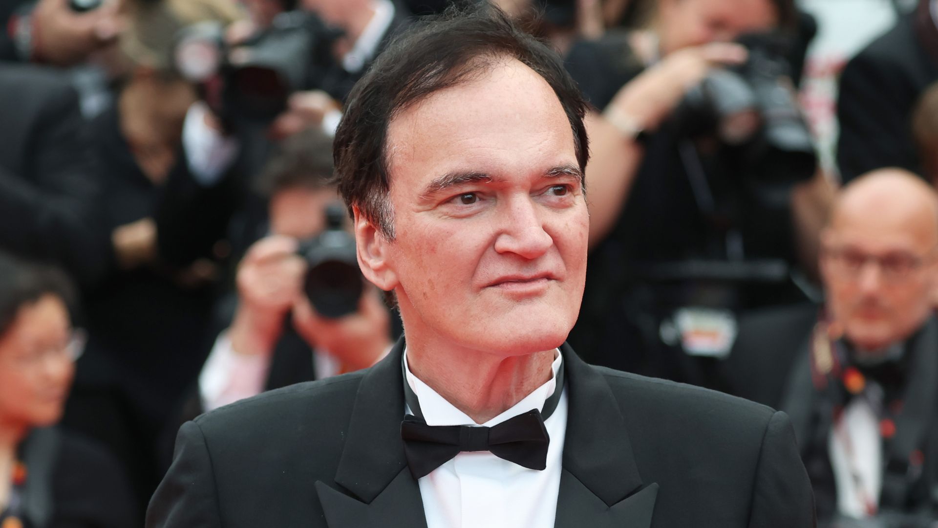 Quentin Tarantino attends the red carpet for the opening ceremony and "Partir Un Jour" (Leave One Day) screening at the 78th annual Cannes Film Festival at Palais des Festivals on May 13, 2025 in Cannes, France