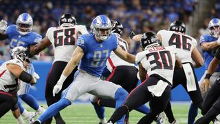 Detroit Lions' Aidan Hutchinson makes a tackle against Atlanta Falcons