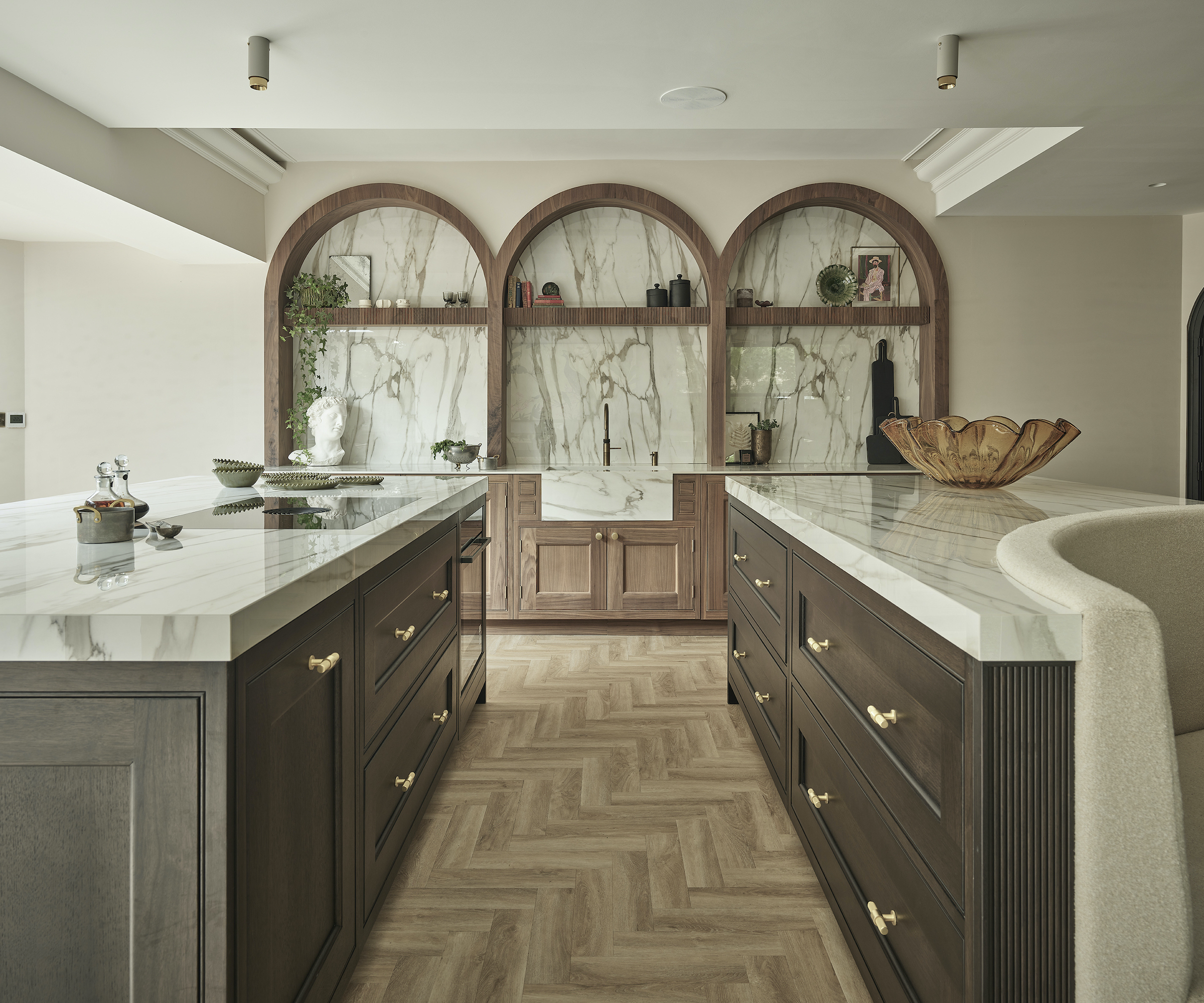 marble and wood kitchen with two islands