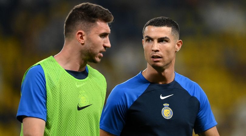 Aymeric Laporte chats to Al-Nassr team-mate Cristiano Ronaldo in November 2023.