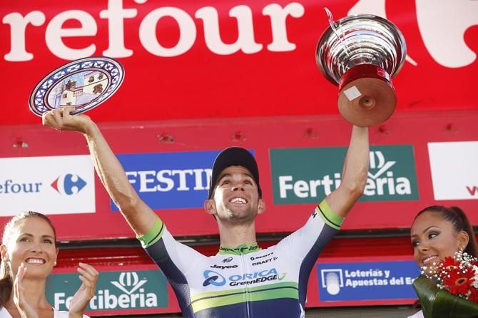 Michael Matthews (Orica - GreenEdge) accepts his awards on the stage 3 podium