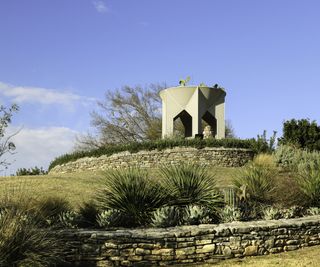 A pavillion on top of a terraced hill at the San Antonio Botanical Garden