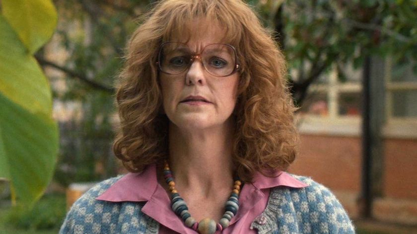 Miss Harris stood by a tree looking confused in Stranger Things