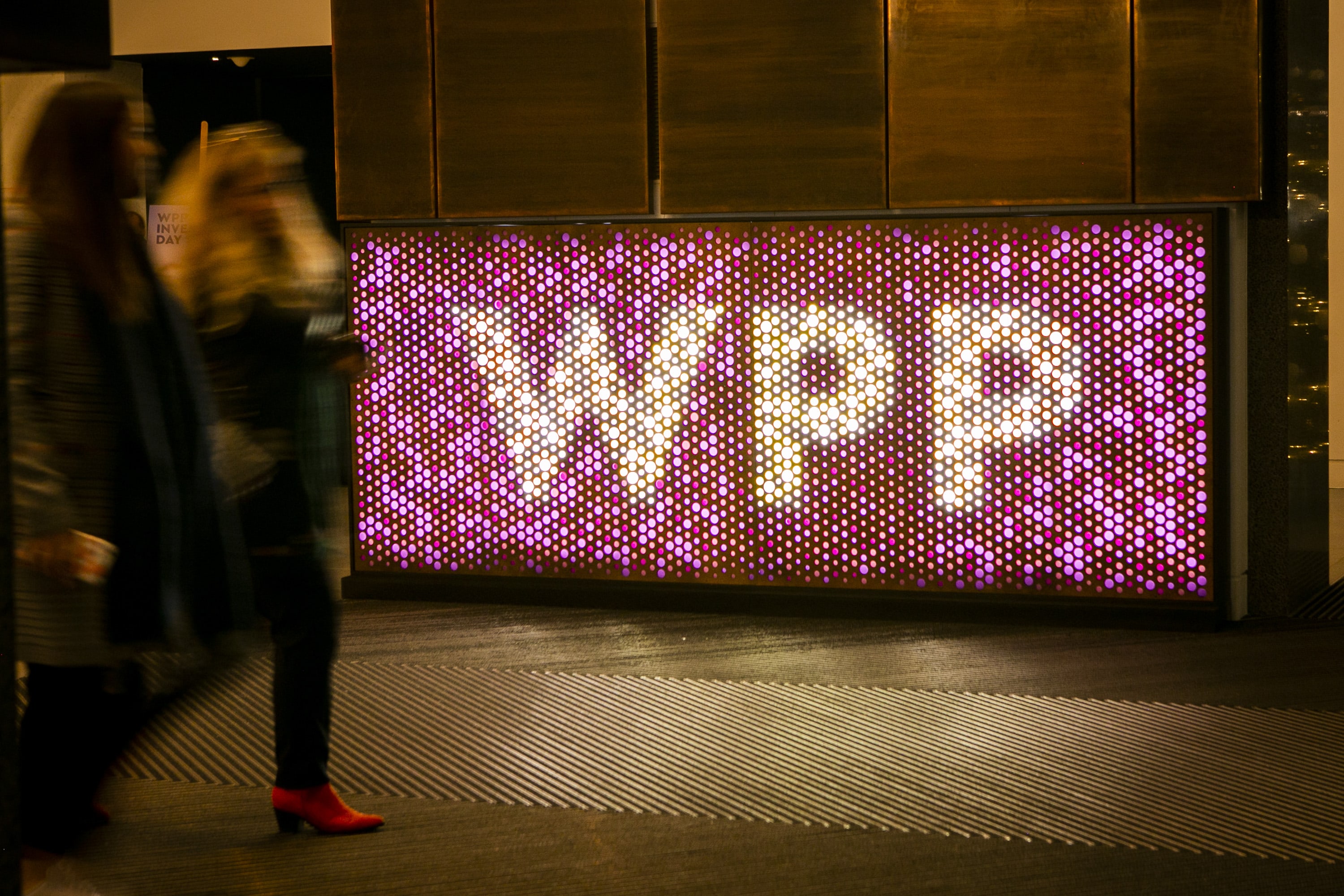 Large colourful WPP sign in office