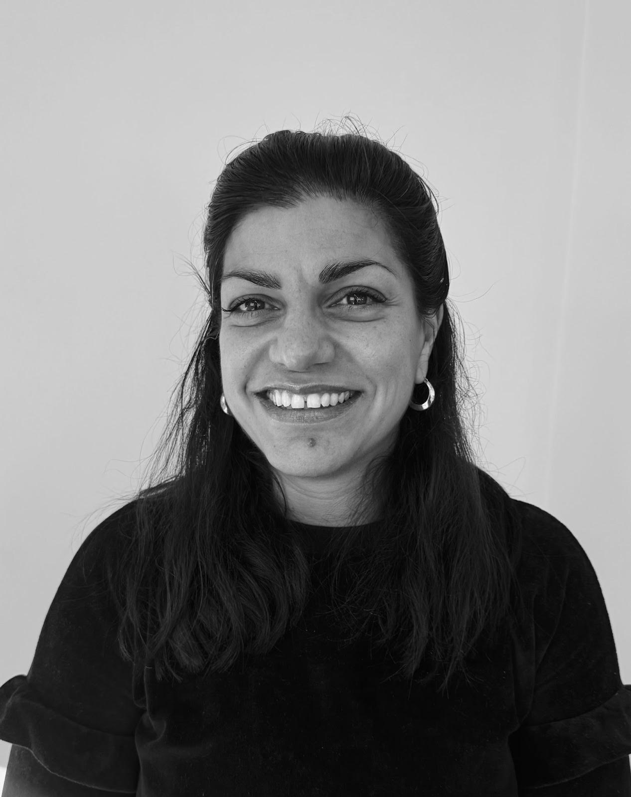 woman smiling, photo in black and white