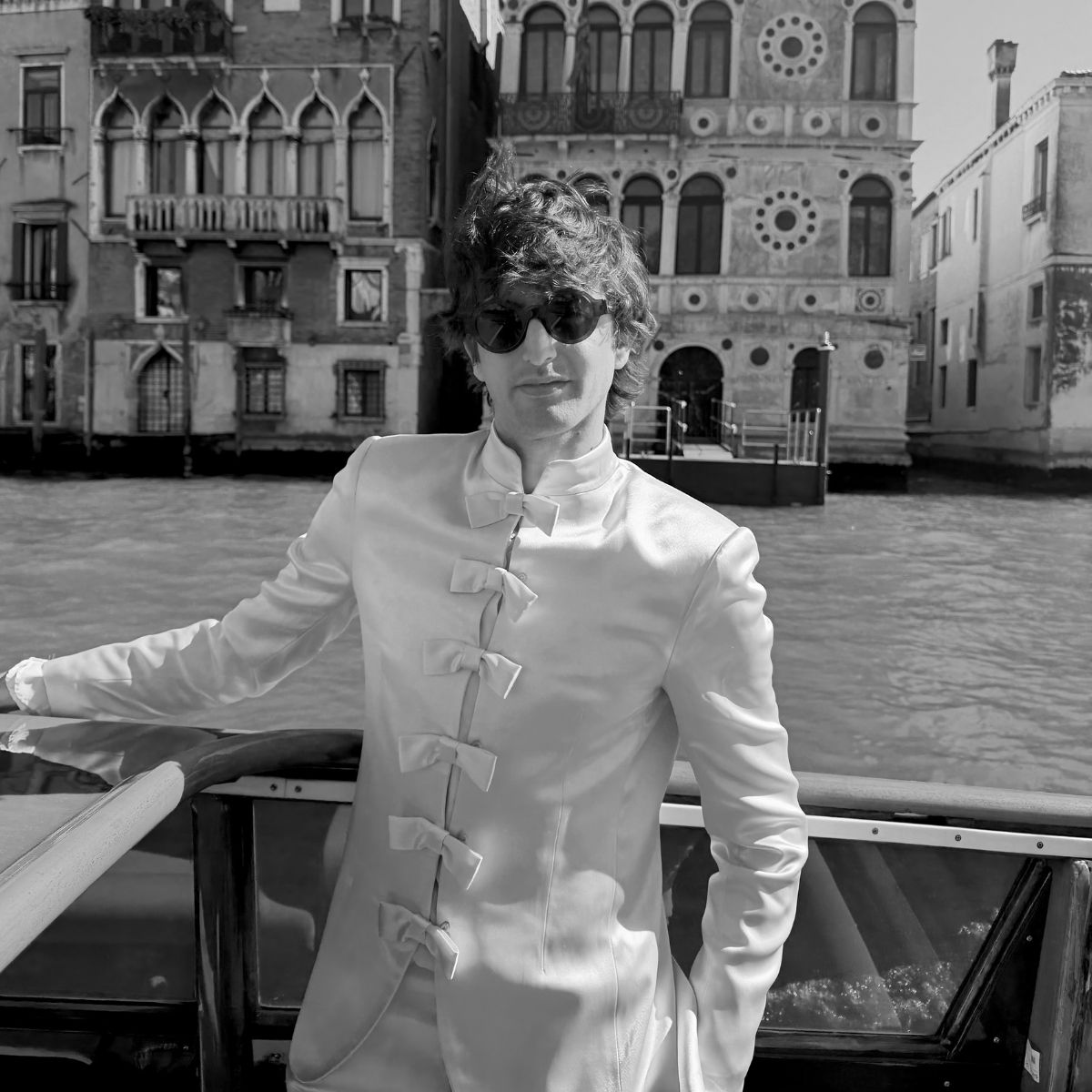 An image of Who What Wear UK Editor in Residence, Max Hurd, in Venice. 