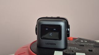 UGreen Nexode RG 65W in socket with tired face