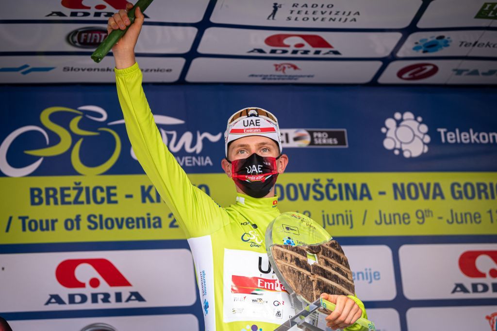 Slovenias Tadej Pogacar of Team UAE celebrates on the podium after winning the Tour of Slovenia cycling race in Novo mesto on June 13 2021 Photo by Jure Makovec AFP Photo by JURE MAKOVECAFP via Getty Images