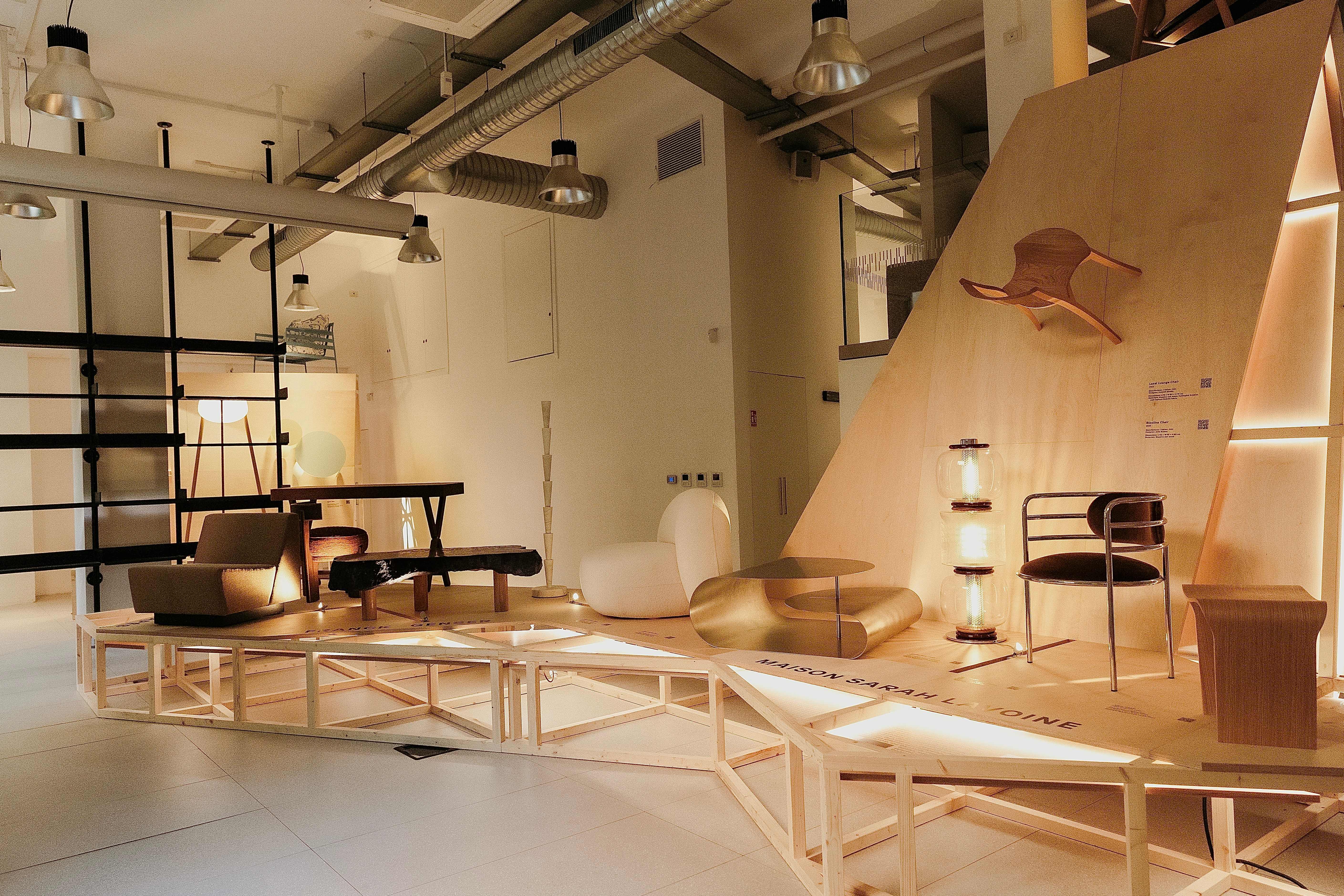 furniture and lighting presented on a wooden platform