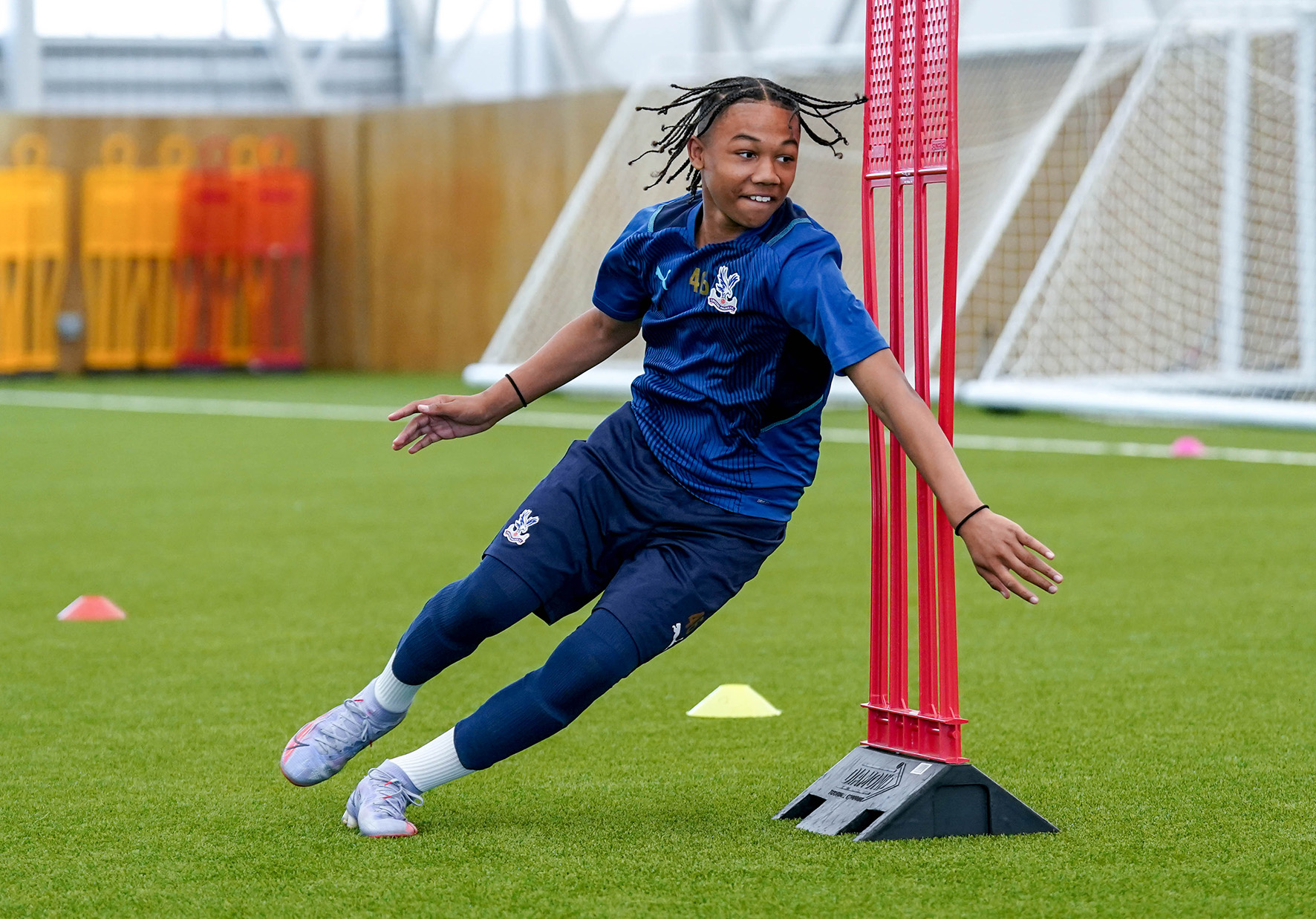 Tv Tonight an academy player weaves around some obstacles in Football Dreams: The Academy