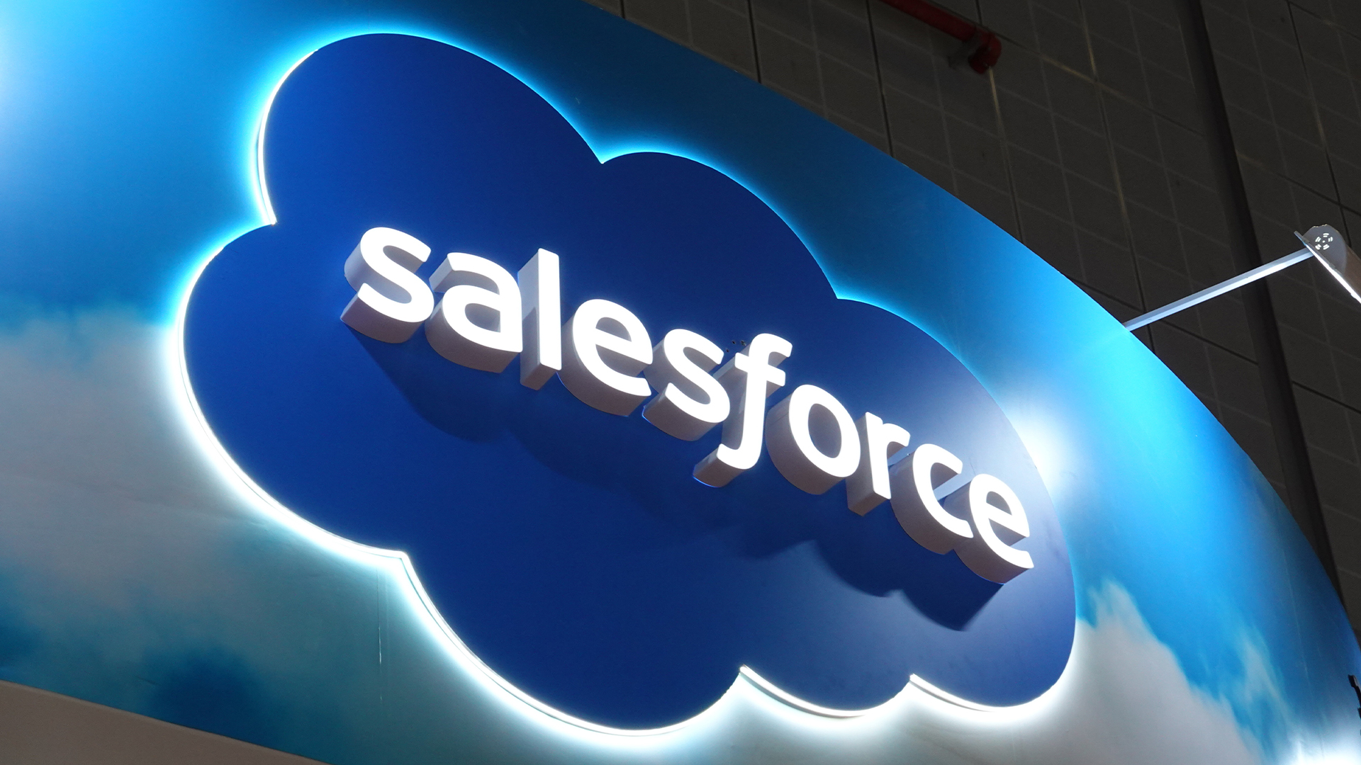 Salesforce logo and branding illuminated on a sign at the 8th China International Import Expo.