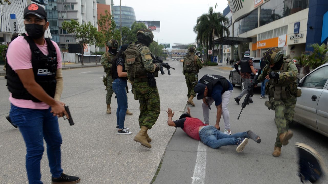 Ecuadorian police arrest several armed men who broke into the set of a public television channel after Ecuador president declares &#039;internal armed conflict&#039;