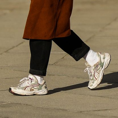 woman wearing sneakers to work