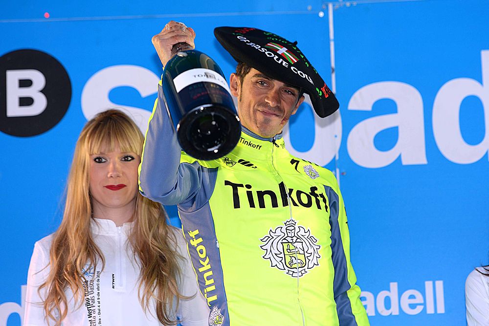 Alberto Contador (Tinkoff) celebrates his overall victory with a bottle of champagne