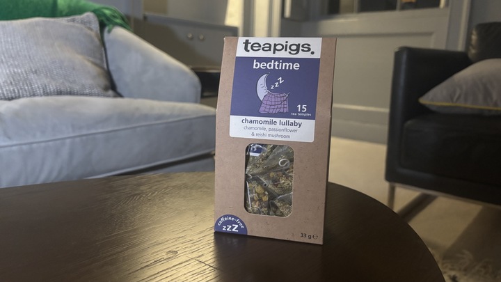 Reishi mushroom tea box on a coffee table.