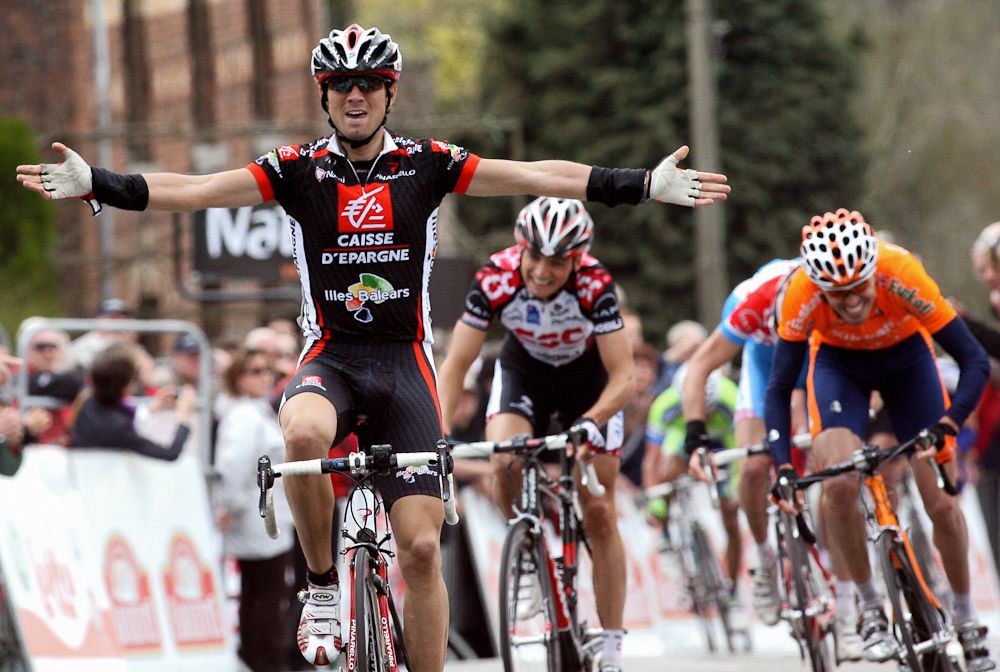 Spain's Alejandro Valverde (Caisse d'Epargne-Iles Baleares) celebrates as he crosses the finish line of the 70th Fleche Wallonne in 2006. Valverde won ahead of compatriot Samuel Sanchez (Euskatel) and Karsten Kroon (Csc Tiscali).