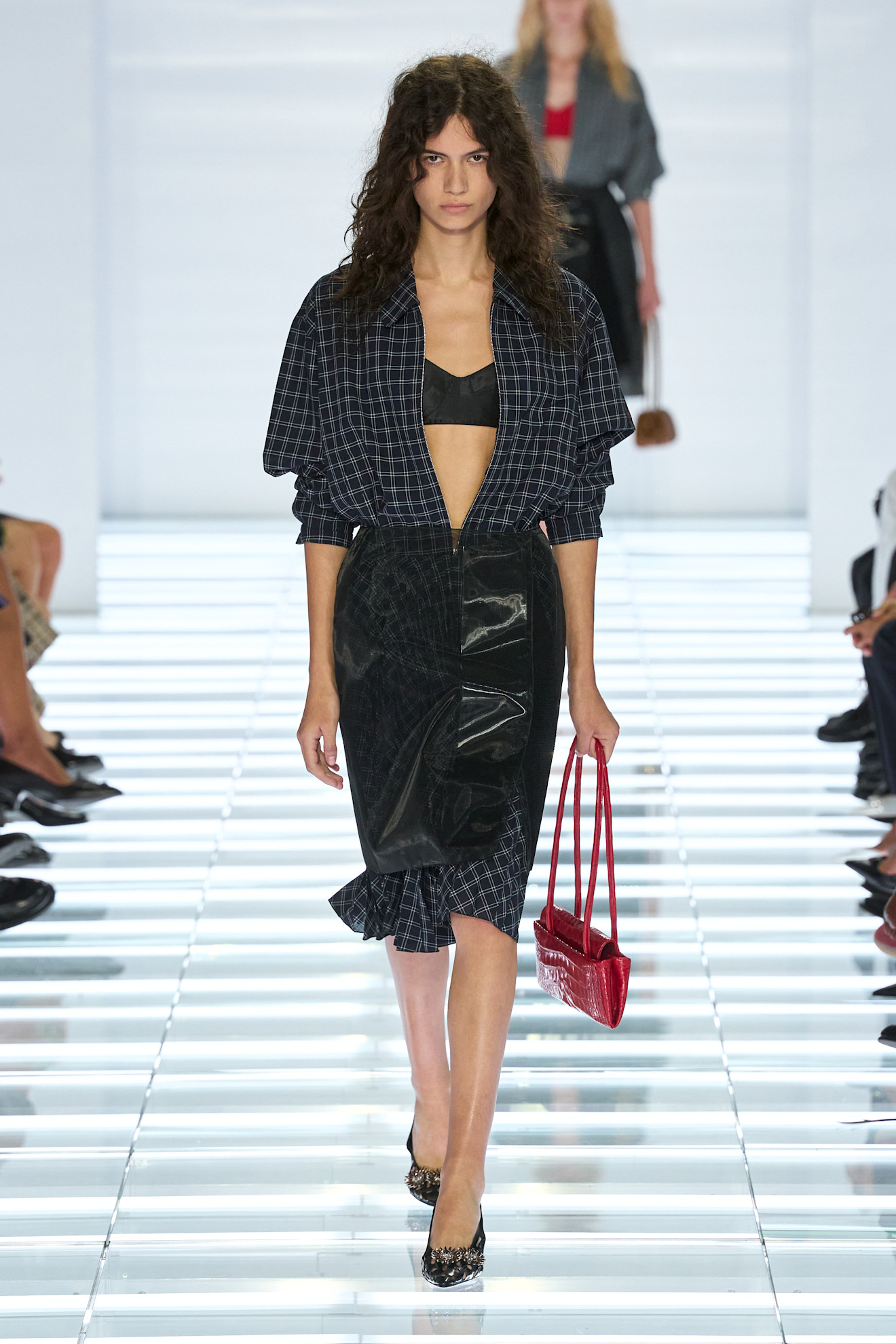 A model wore the peekaboo bra trend on Prada's Spring 2027 runway