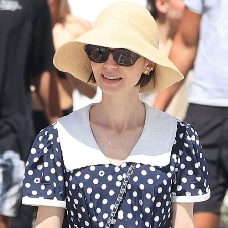 Lily Collins styled the mesh ballet flats trend in Greece on a day off from filming Emily in Paris Season 6