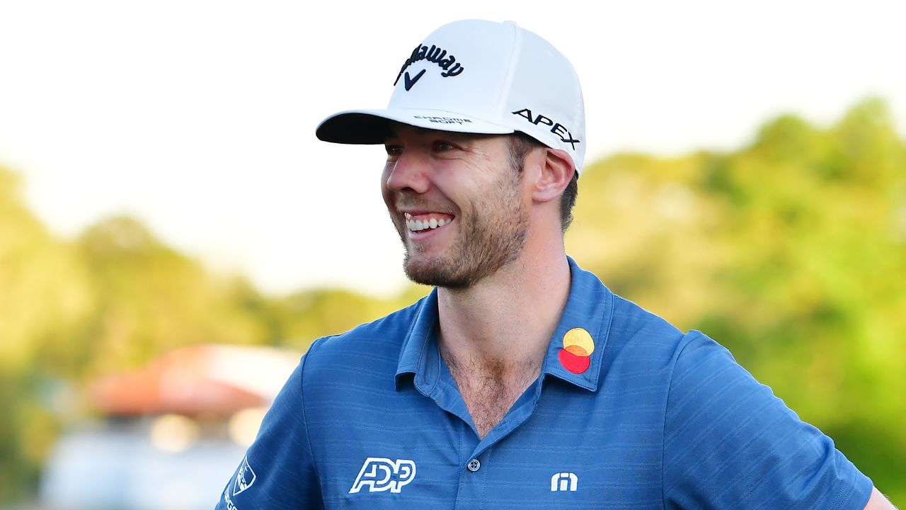 Sam Burns smiling after winning the 2022 Valspar Championship at the Copperhead Course