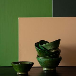 green and cream paint with green bowl